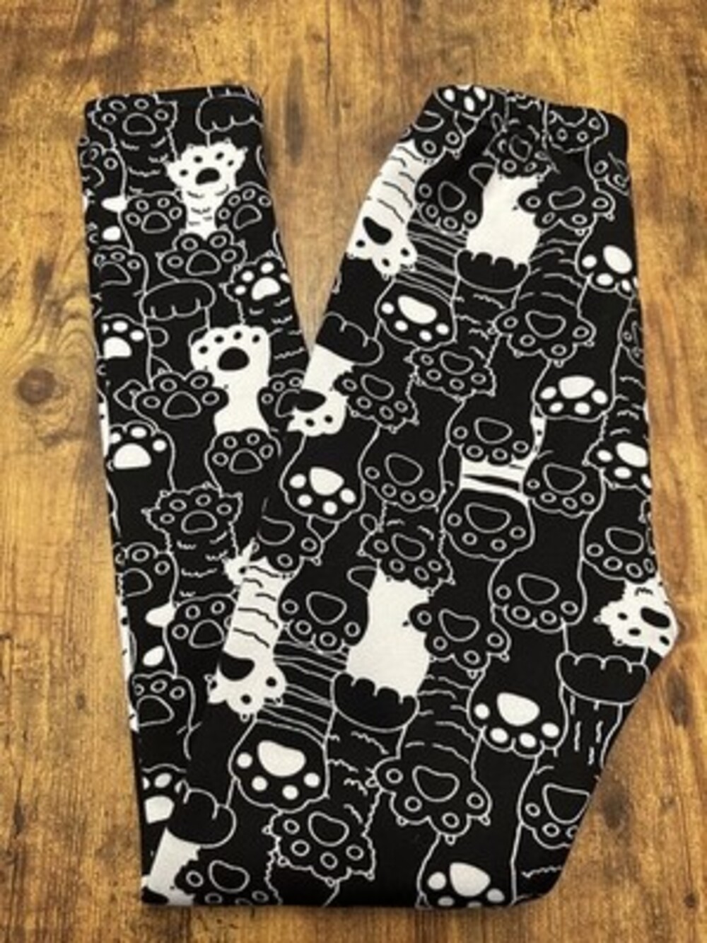 Cozy Black and White Cat Paw Print Fleece Lined Leggings
